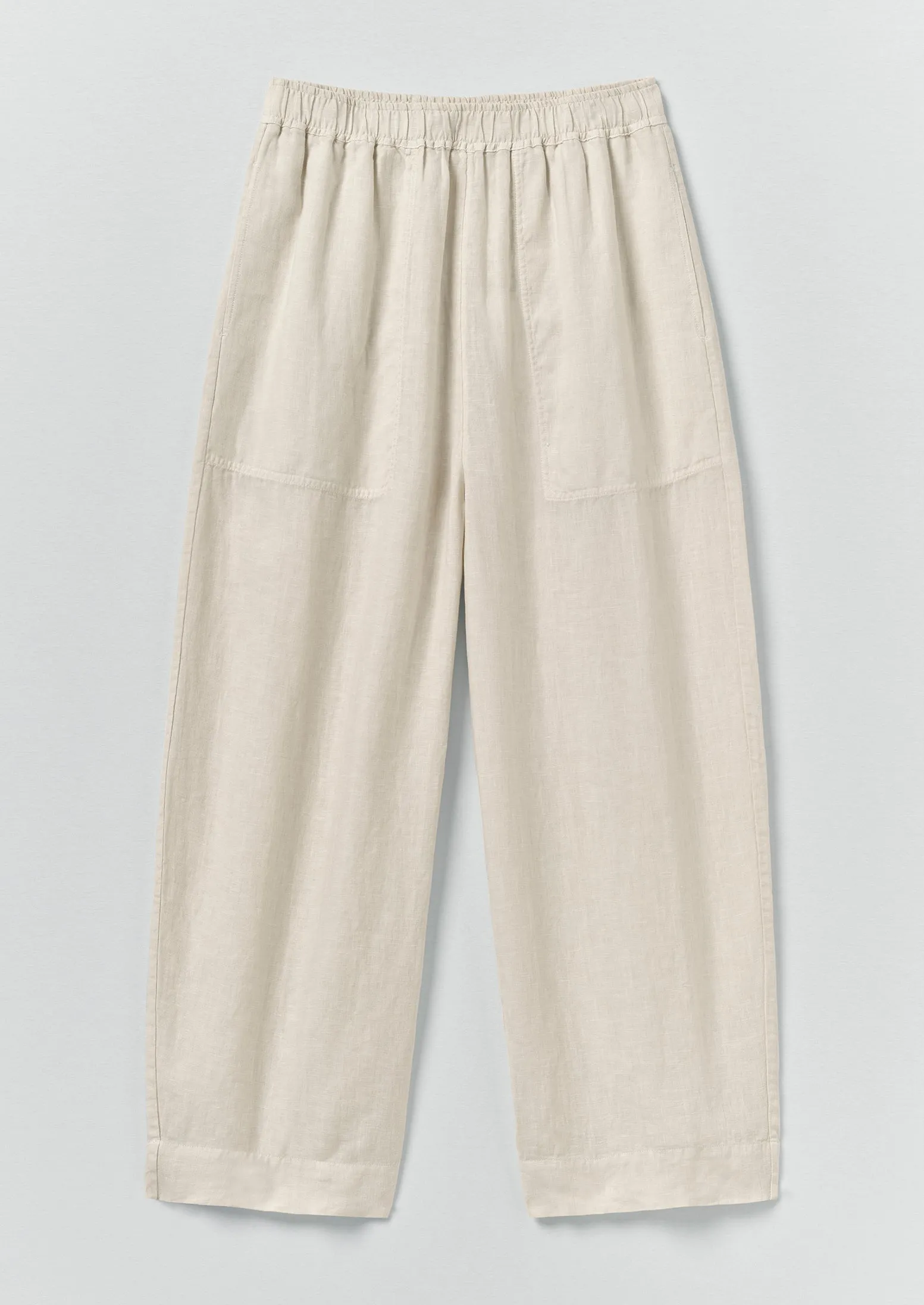 Garment Dyed Linen Barrel Leg Trousers | Oat sold by TOAST
