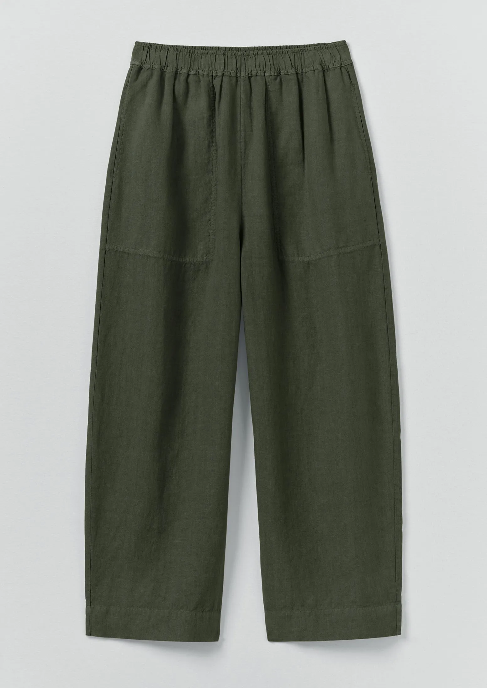 Garment Dyed Linen Barrel Leg Trousers | Dark Olive sold by TOAST