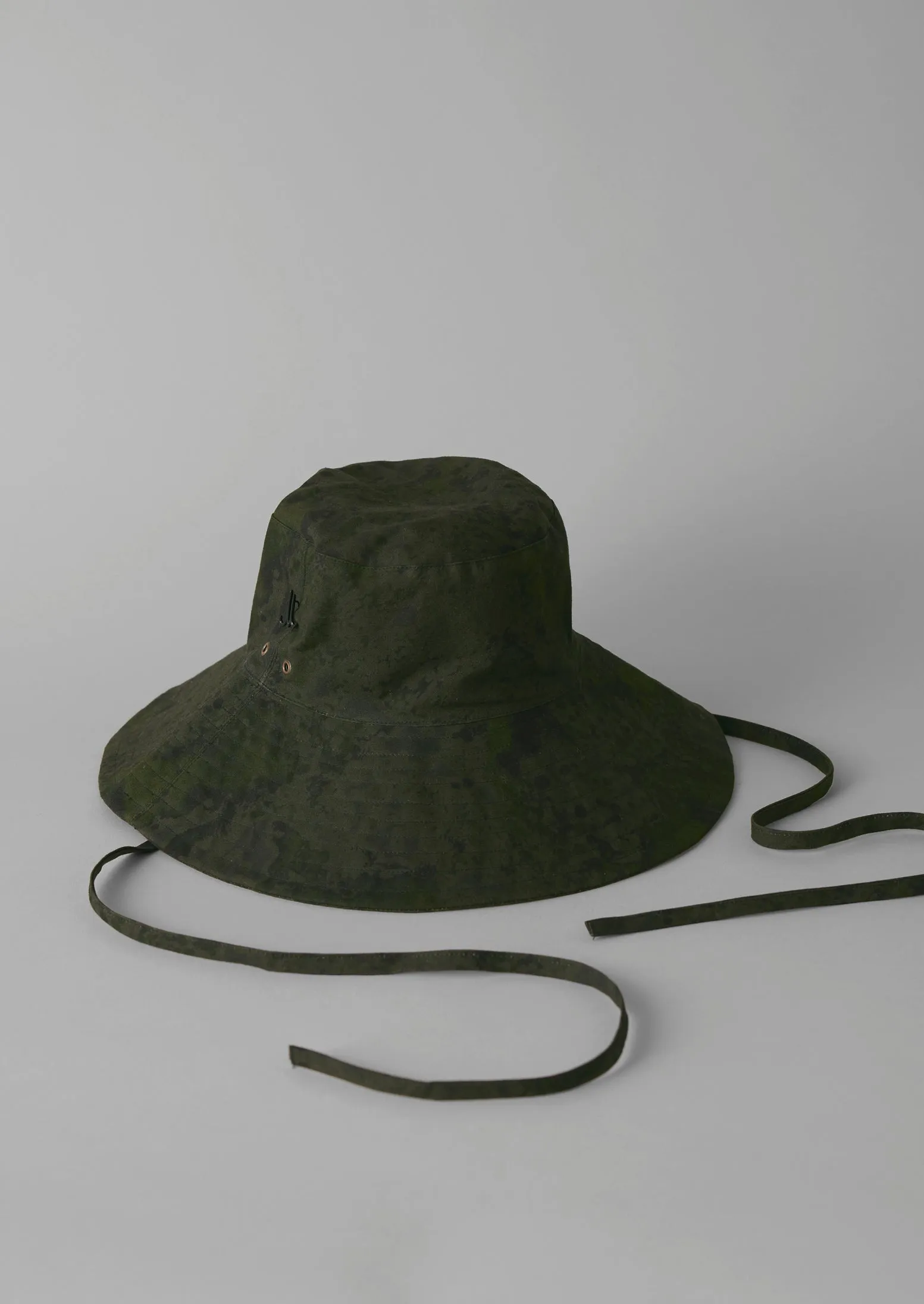 Muehlbauer Waxed Cotton Tie Hat | Forest sold by TOAST