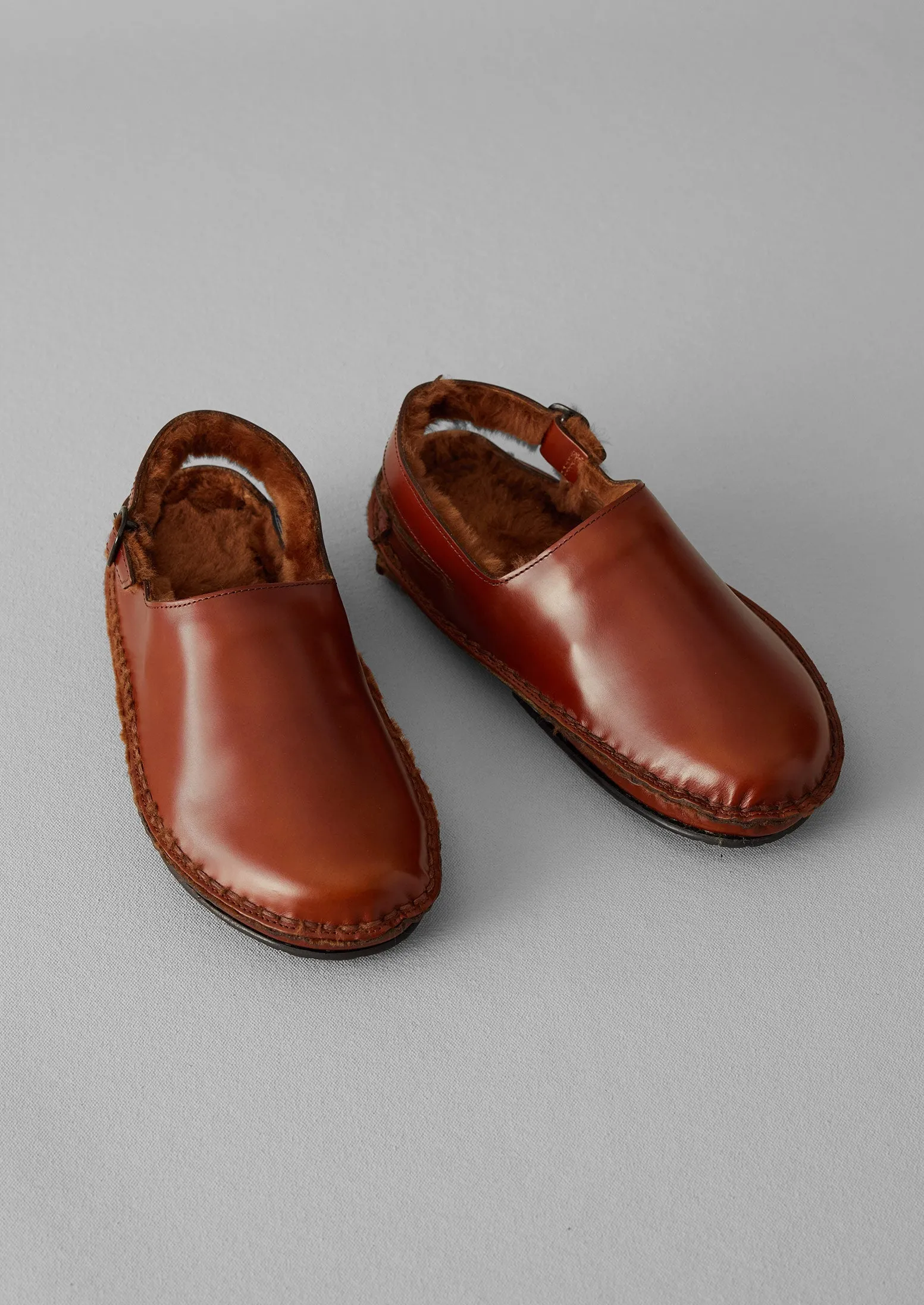 Hereu Cargol Sheepskin Mules | Tan sold by TOAST