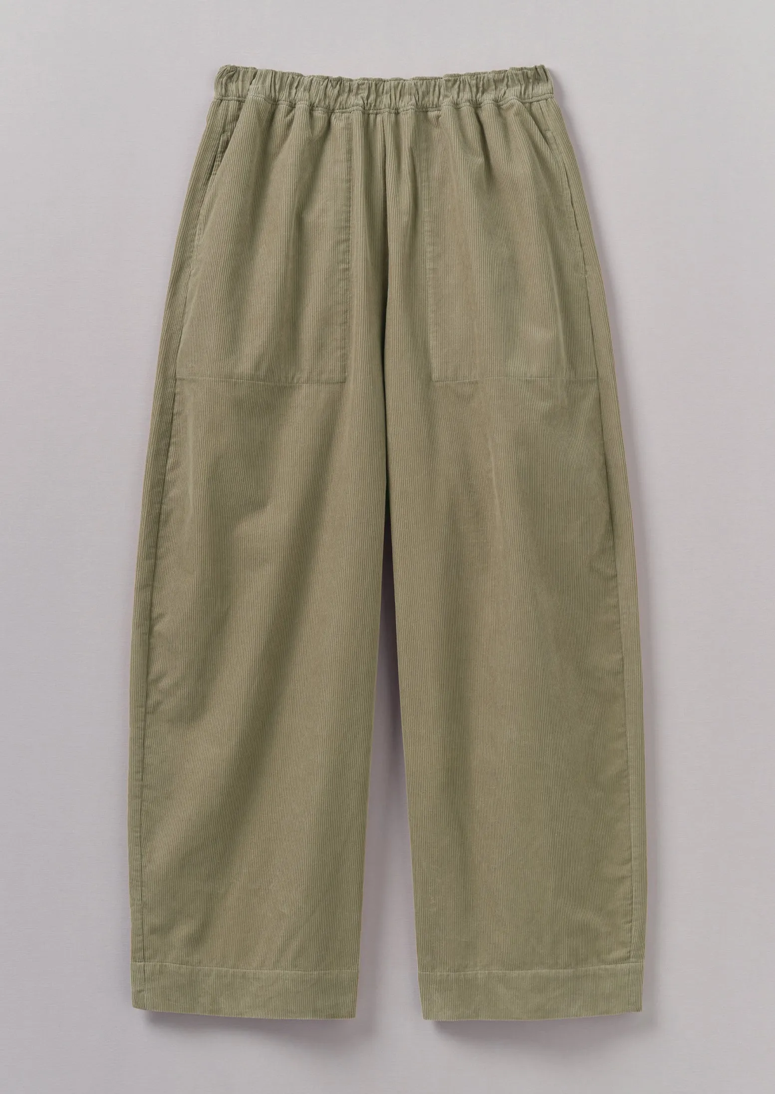 Organic Cord Barrel Leg Trousers | Green Stone sold by TOAST