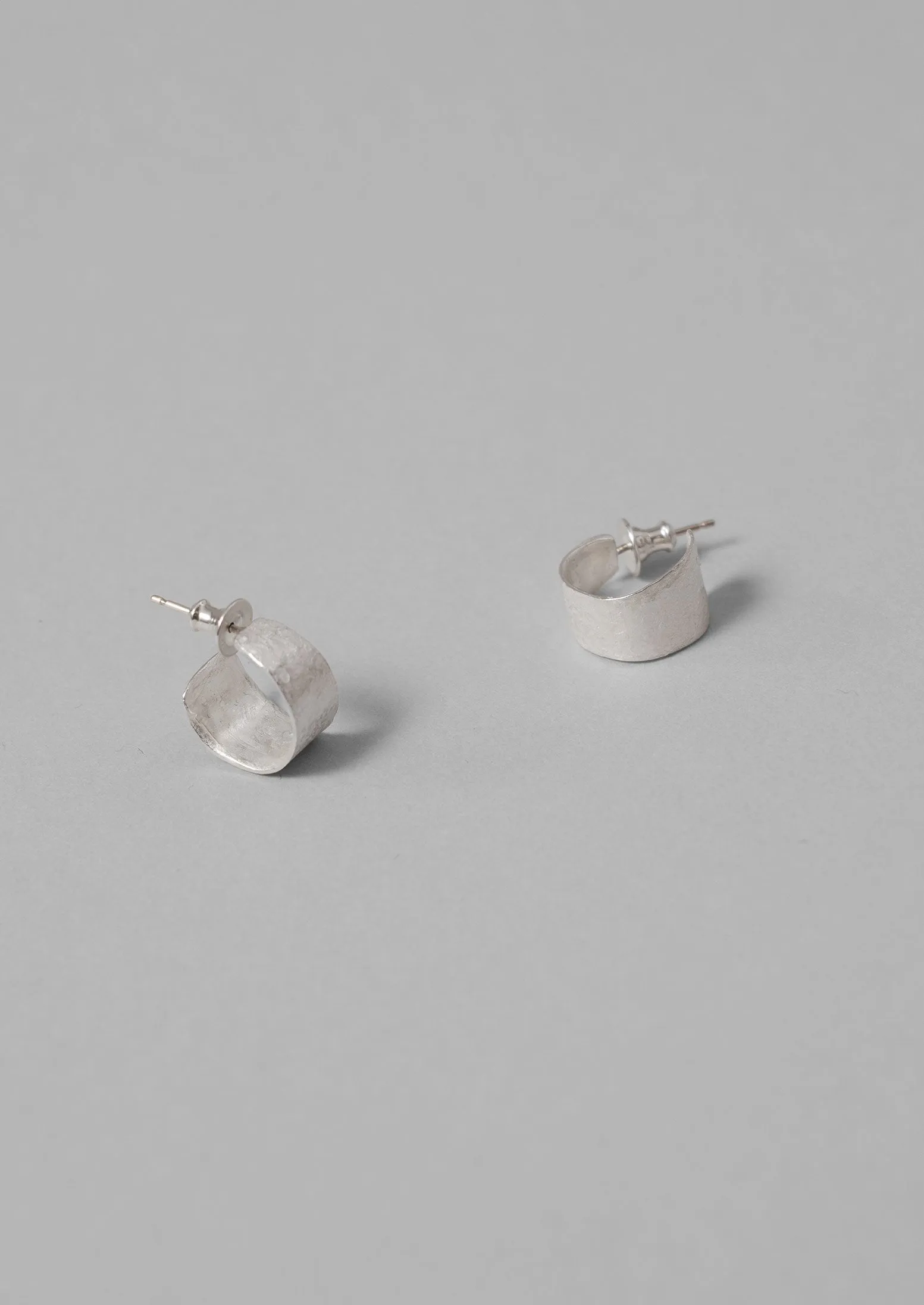 Emily Nixon Sculptural Hoop Earrings | Silver sold by TOAST