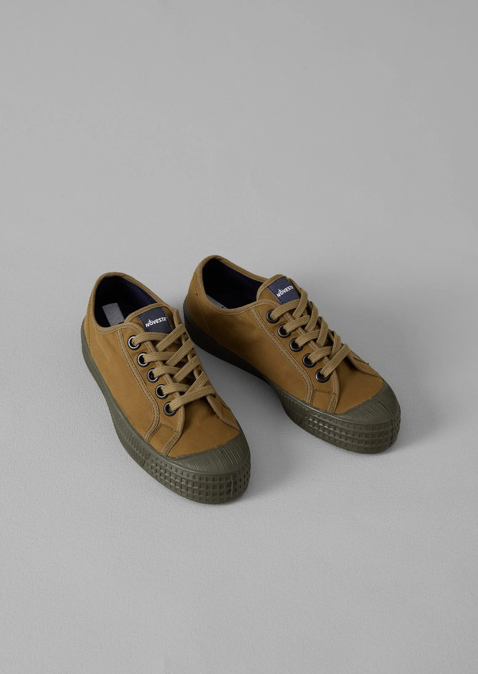 Novesta Waxed Cotton Canvas Plimsolls | Bark sold by TOAST