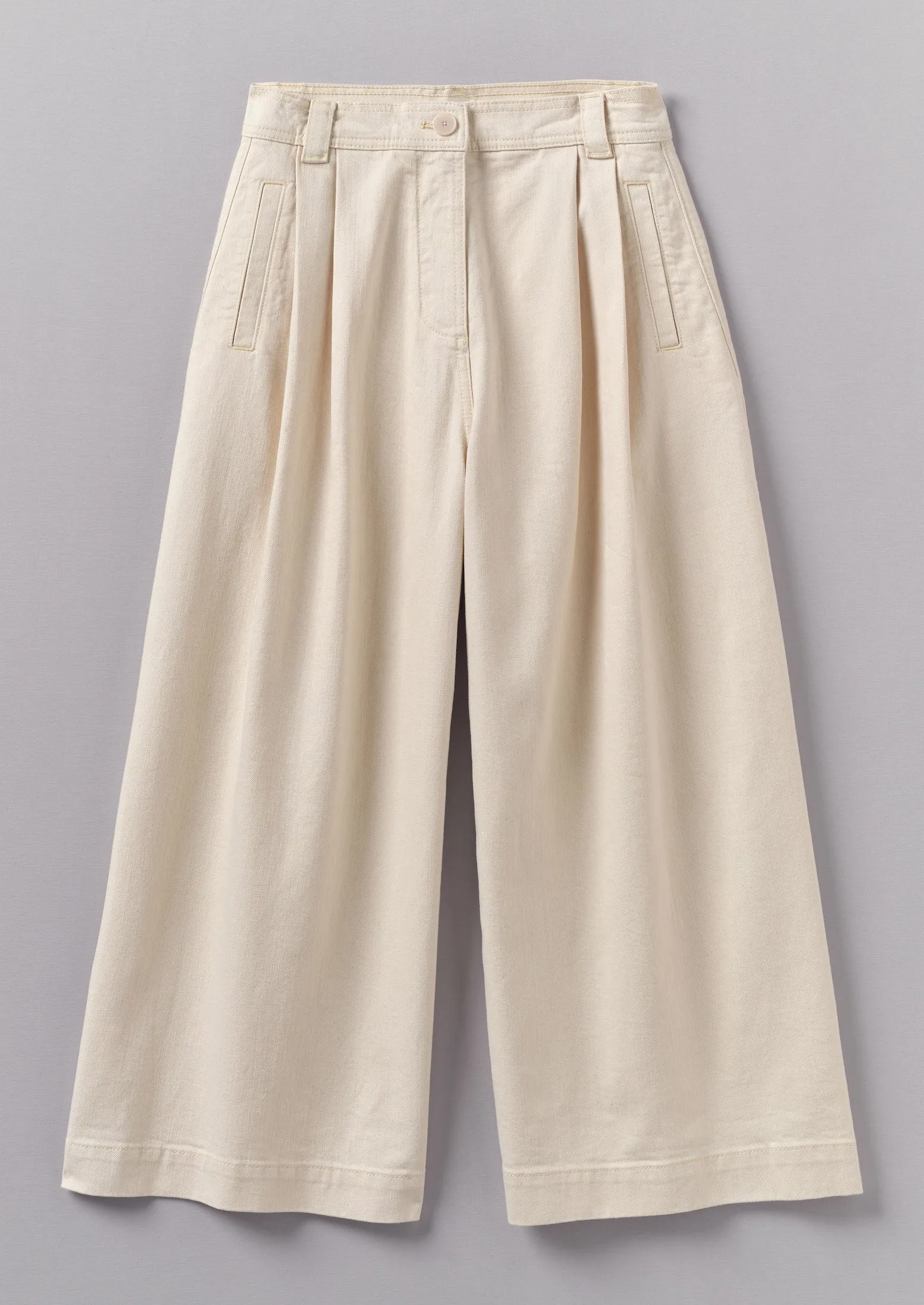 Ecru Denim Pleat Front Trousers | Ecru sold by TOAST