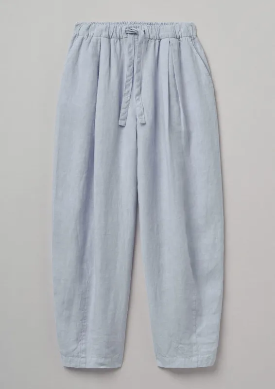 Garment Dyed Linen Balloon Trousers | Egg Blue sold by TOAST