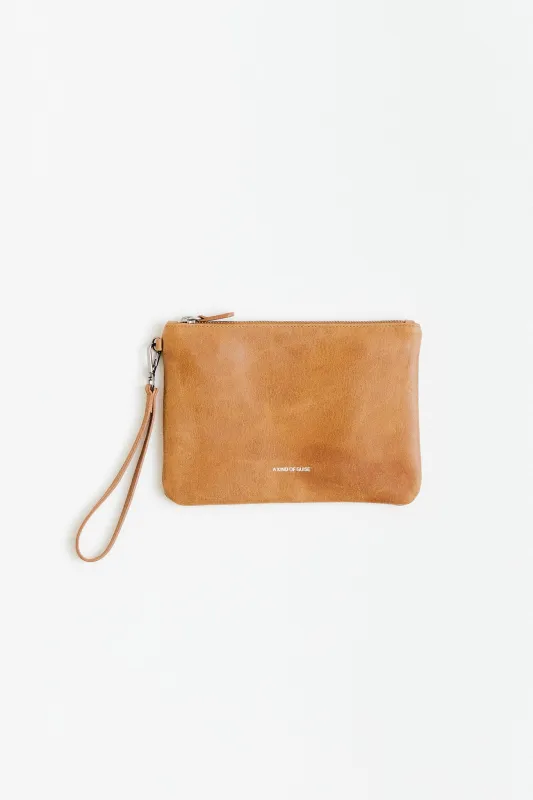 LEATHER POUCH sold by A Kind of Guise