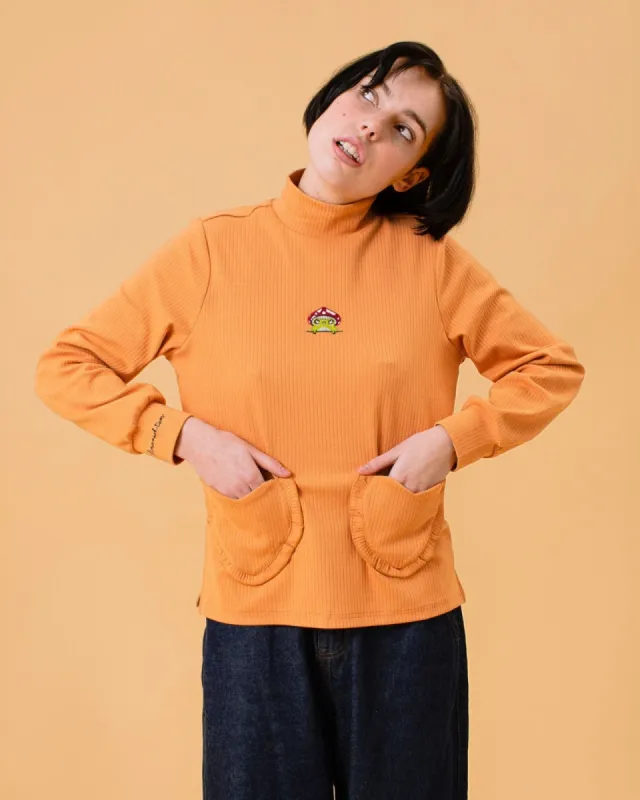 The Toadstool Top sold by Kina and Tam