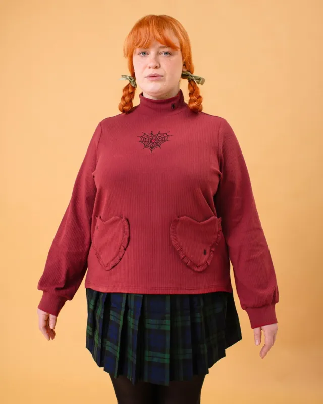 The Loveweb Top sold by Kina and Tam