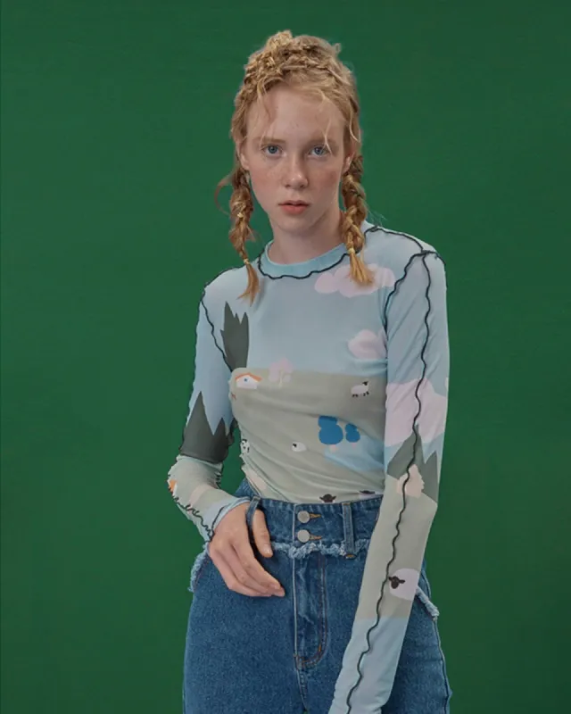 The Landscape Mesh Top sold by Kina and Tam