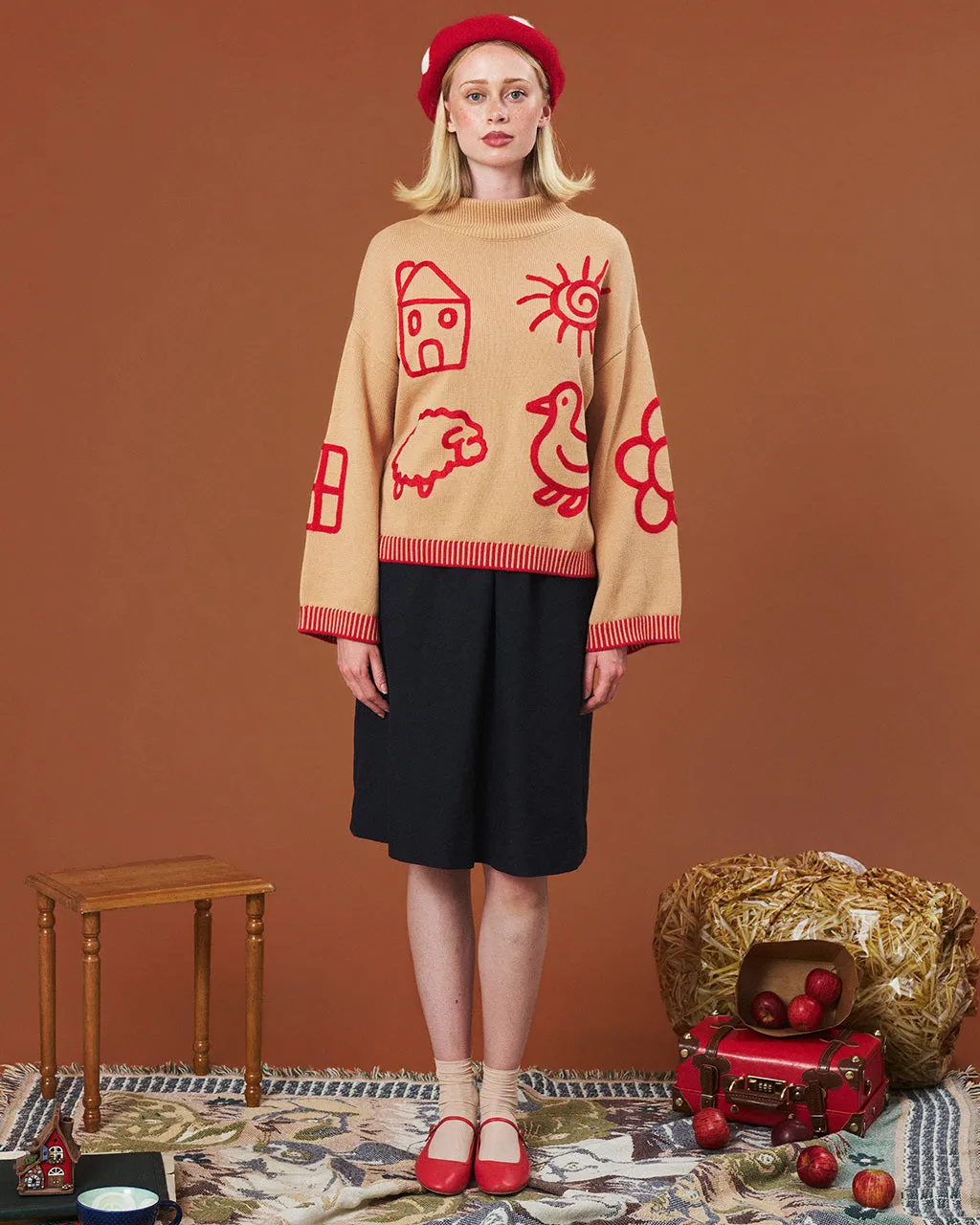 The Doodle Sweater sold by Kina and Tam