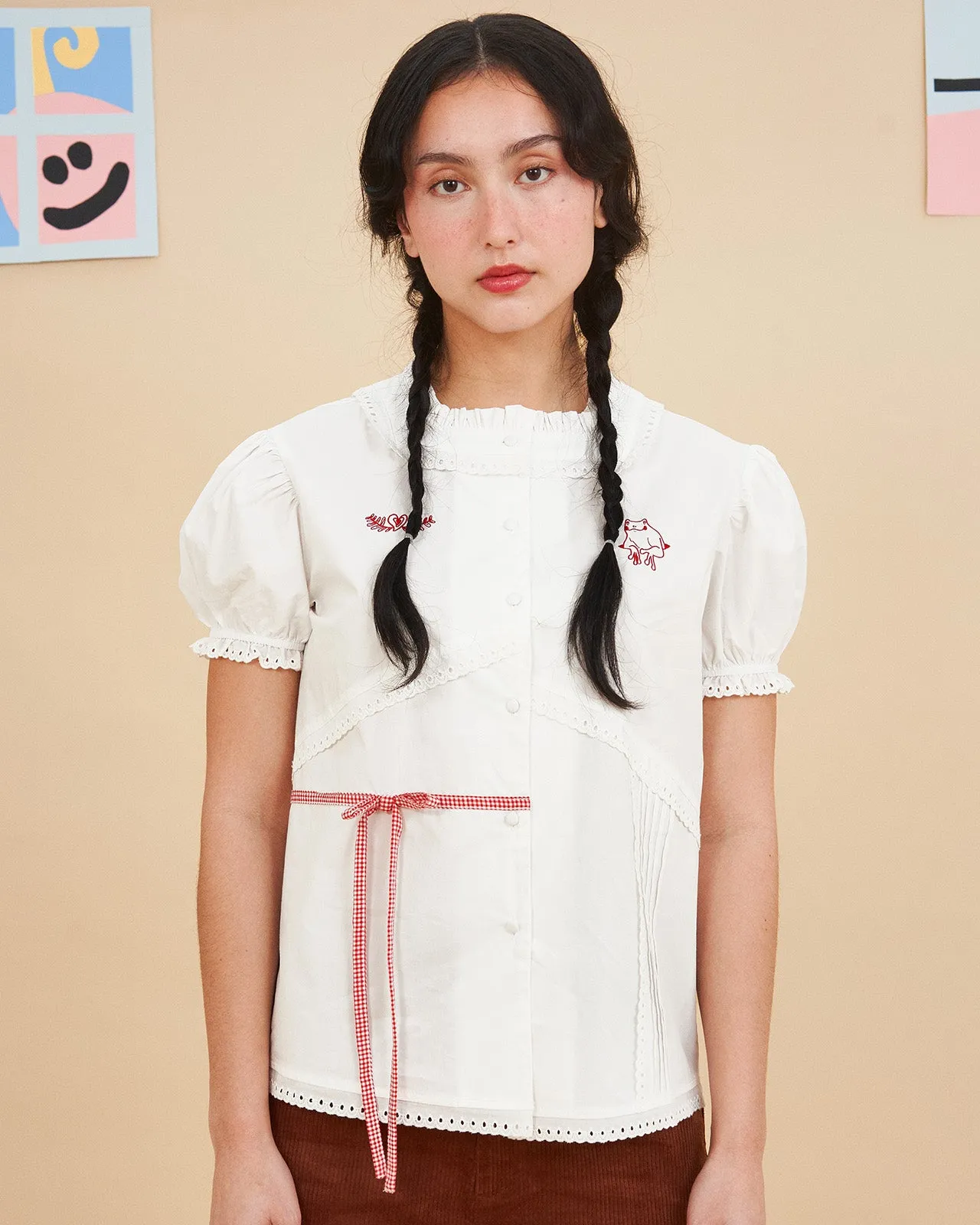 The Frog and Frills Blouse sold by Kina and Tam