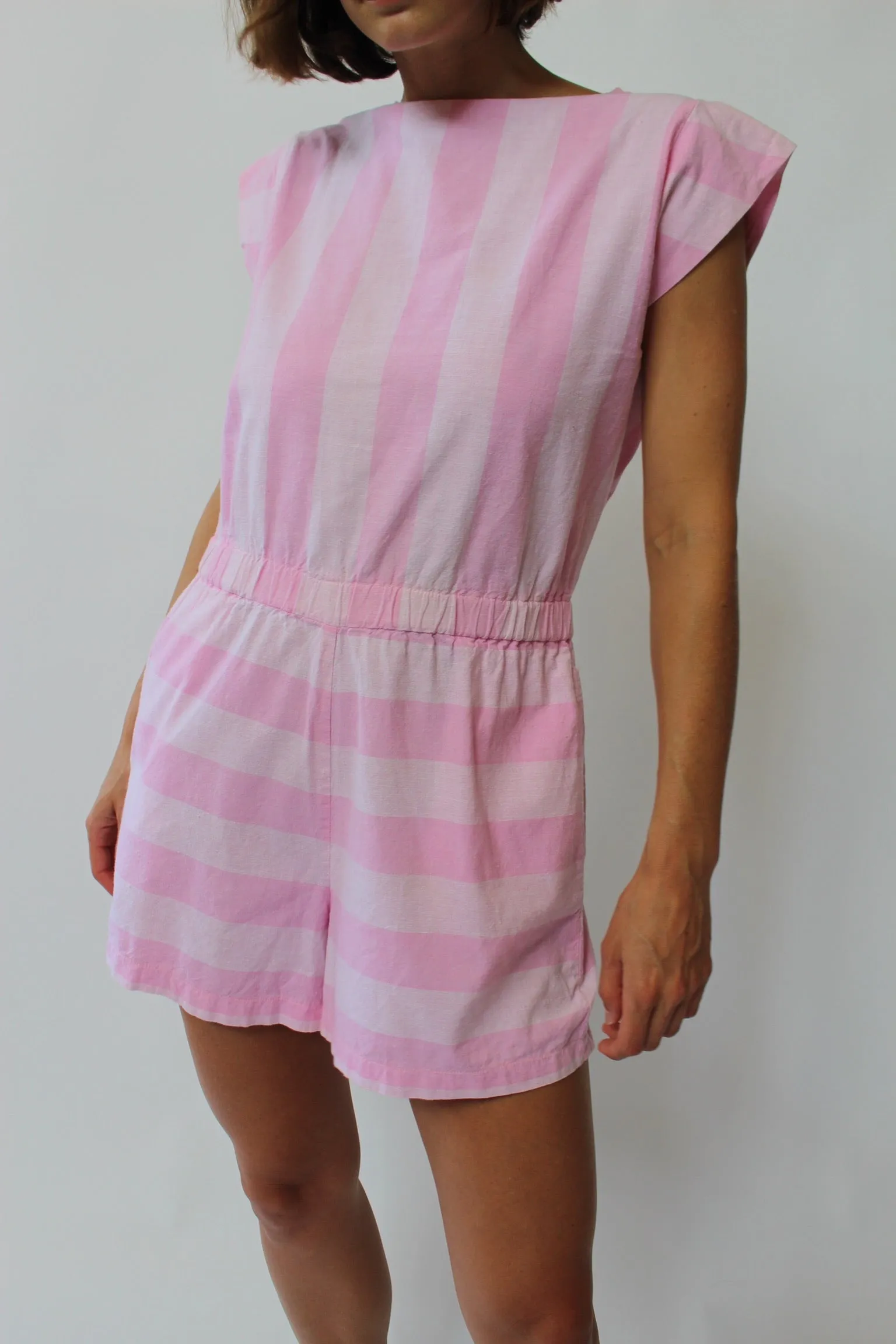 Beautiful Pink Striped Romper sold by NA NIN