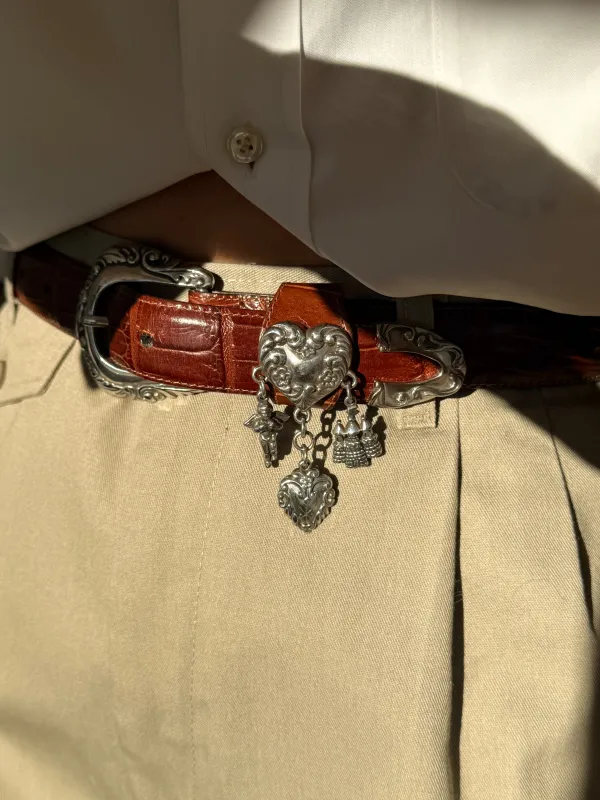 Favorite Vintage Embossed Leather & Silver Charm Belt sold by NA NIN