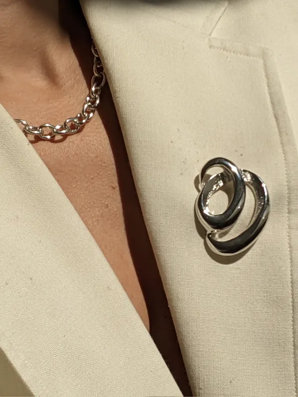 Vintage Bright Silver Swirl Brooch sold by NA NIN