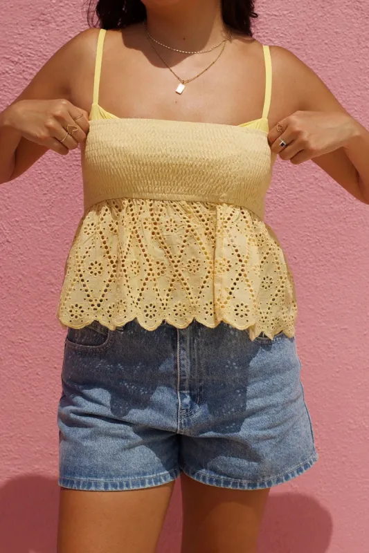 Sunny Top sold by Dippin Daisy’s