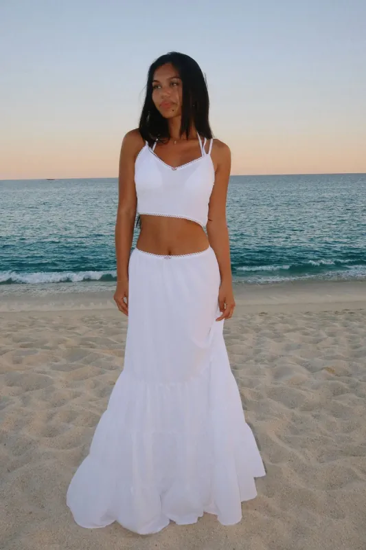 Claire Tiered Maxi Skirt sold by Dippin Daisy’s
