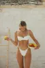 Lucca Cheeky Bikini Bottom sold by Dippin Daisy’s