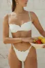 Lucca Cheeky Bikini Bottom sold by Dippin Daisy’s