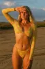 Quinn Knotted Cheeky Bikini Bottom sold by Dippin Daisy’s
