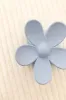Oopsy Daisy Hair Claw Clip sold by Dippin Daisy’s