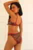 Glow Cheeky Swim Bikini Bottom sold by Dippin Daisy’s