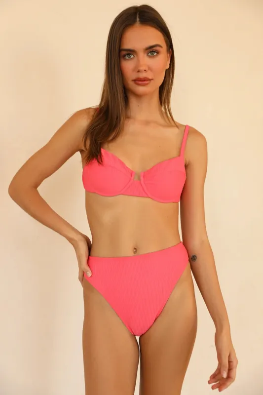 Gigi Top sold by Dippin Daisy’s
