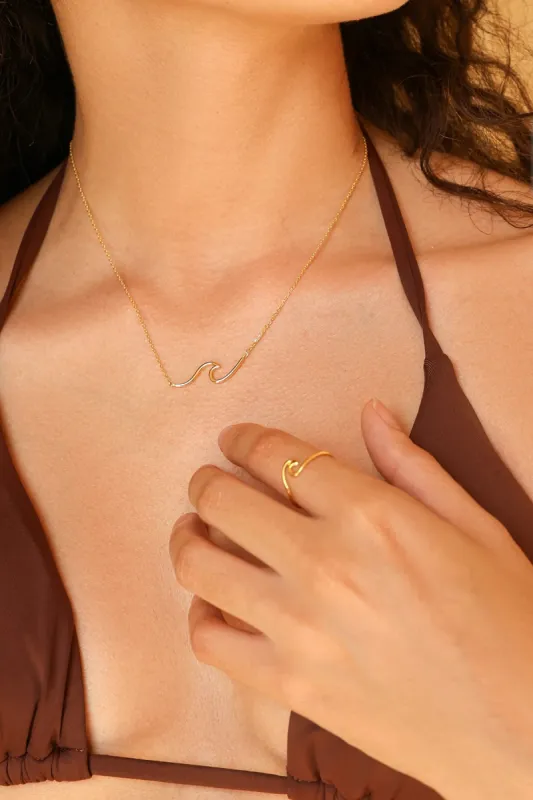 Ride The Wave Necklace sold by Dippin Daisy’s