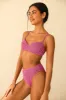 Gigi Top sold by Dippin Daisy’s