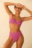 Gigi Top sold by Dippin Daisy’s