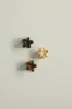 Dainty Petals Claw Clip sold by Dippin Daisy’s
