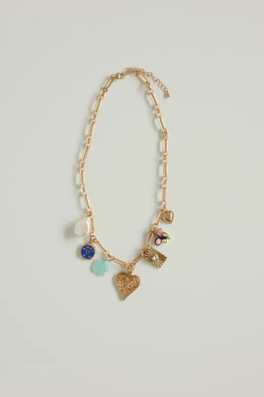Enchanted Charm Necklace sold by Dippin Daisy’s