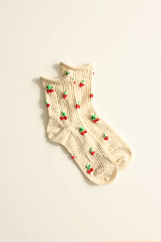 Cherry Bloom Socks sold by Dippin Daisy’s