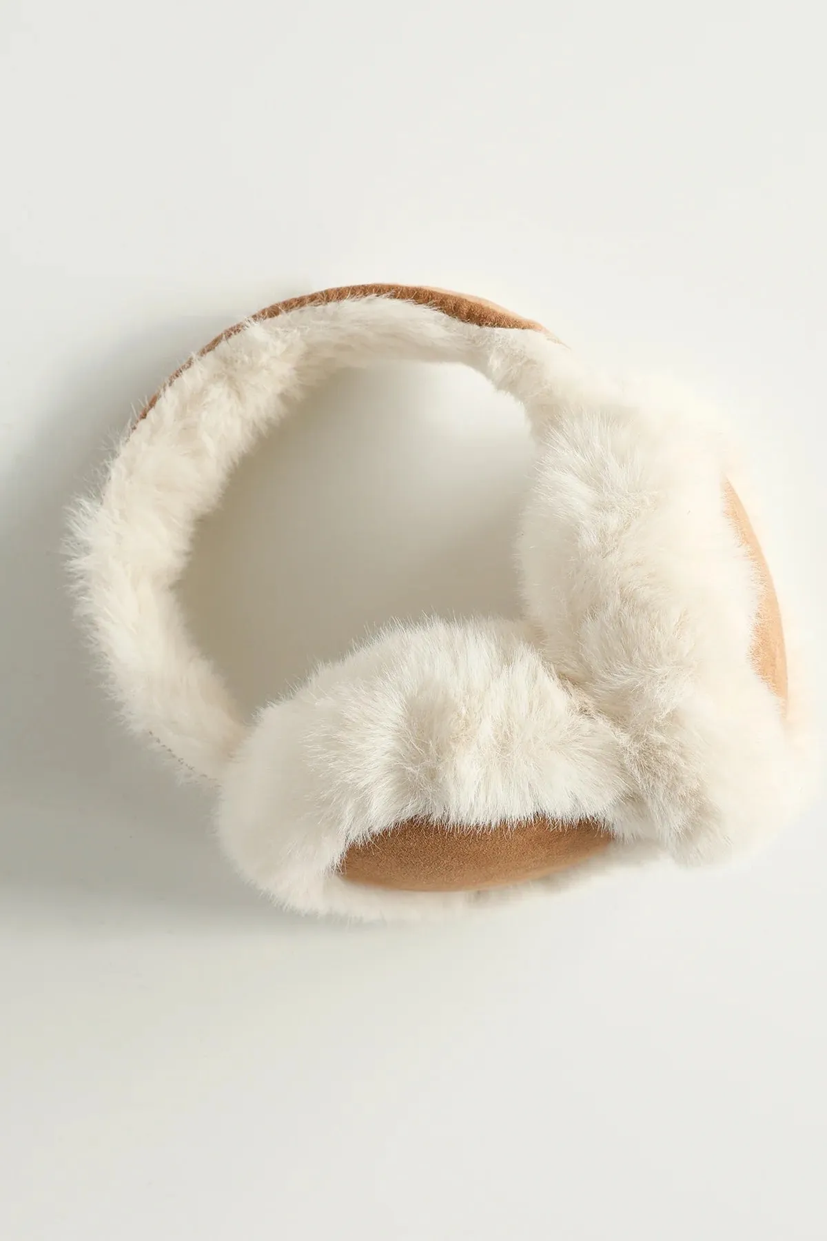 Cozy Sherpa Earmuffs sold by Dippin Daisy’s