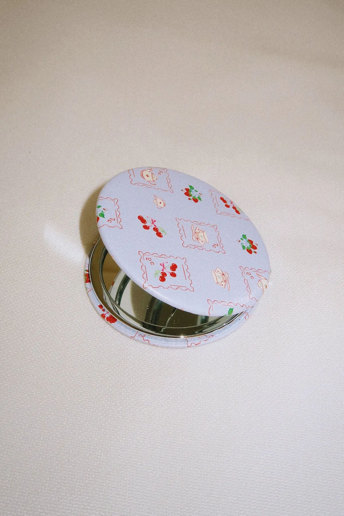 Compact Mirror sold by Dippin Daisy’s