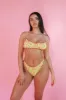 Bonita Ruffled Bikini Top sold by Dippin Daisy’s