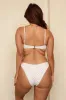 Seashell Siren Triangle Cheeky Set sold by Dippin Daisy’s