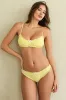 Bonita Ruffled Bikini Top sold by Dippin Daisy’s