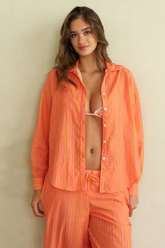 Olivia Top sold by Dippin Daisy’s