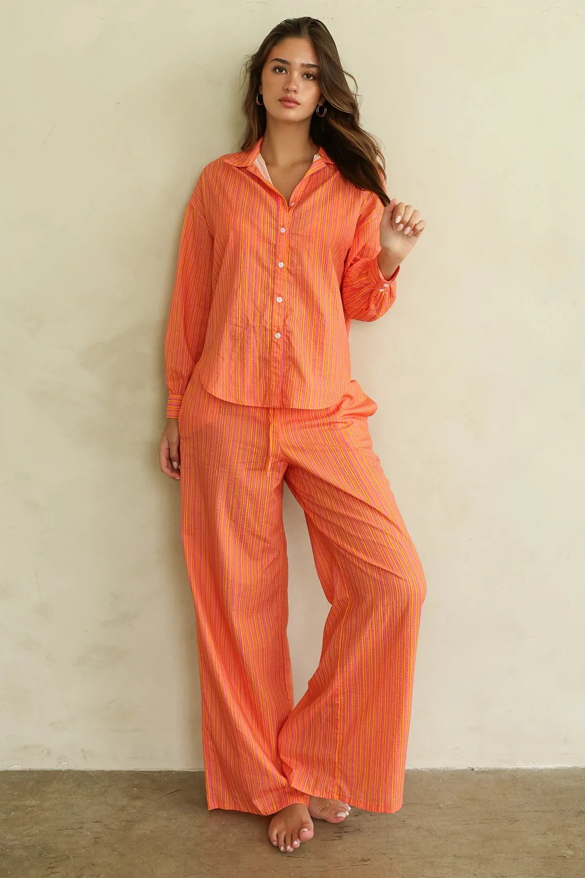 Bellini Stripe Button Up Pants Set sold by Dippin Daisy’s