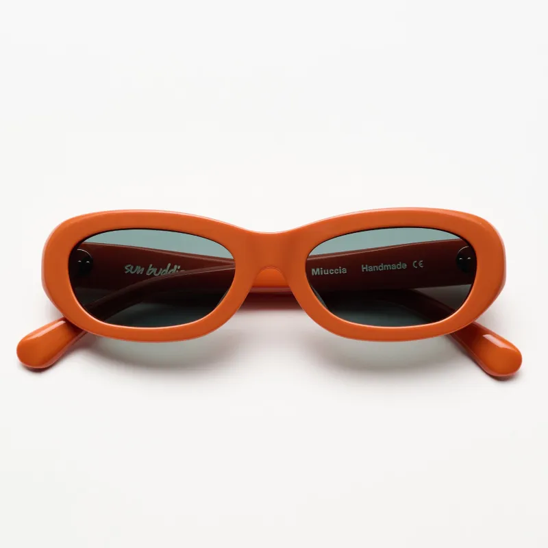 Miuccia Tangerine sold by Sun Buddies