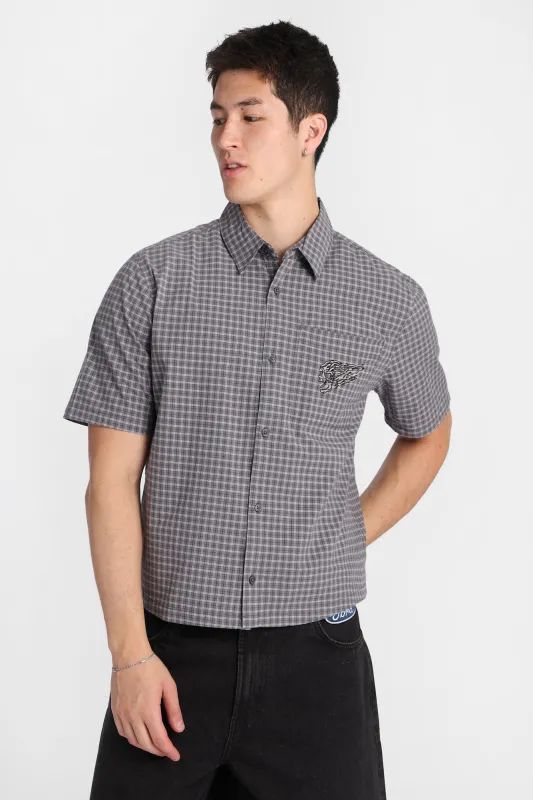 Skull Embroidered Plaid Button-Up Shirt made by Bluenotes