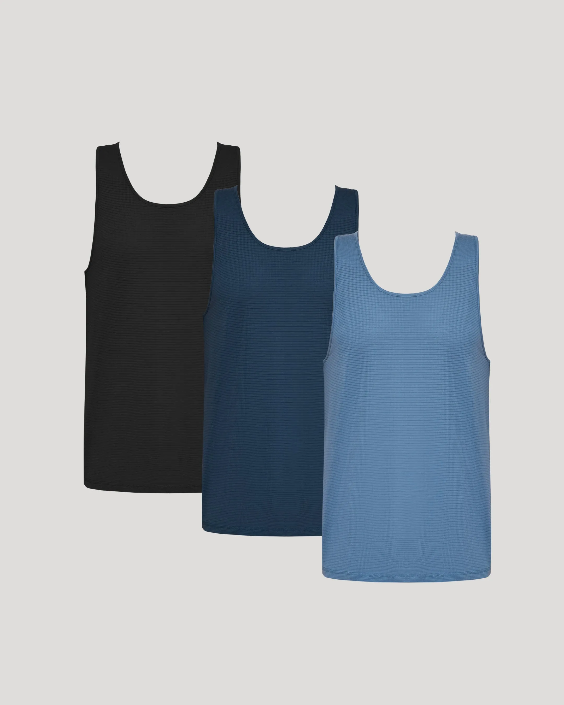 The Staple Sleeveless Active Mesh Tank 3-Pack sold by True Classic
