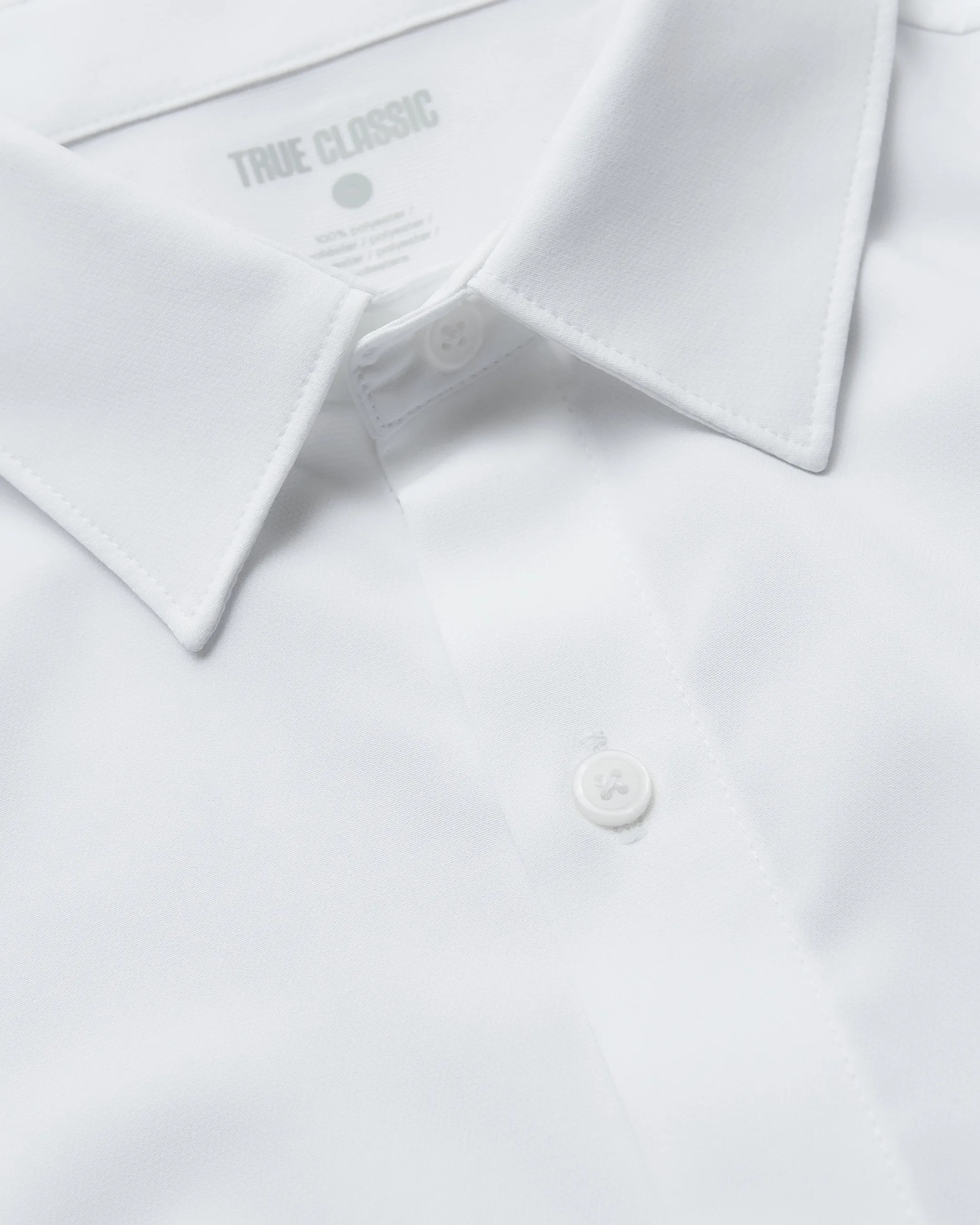 White & Navy Short Sleeve Performance Dress Shirt 2-Pack sold by True Classic product image thumbnail 4