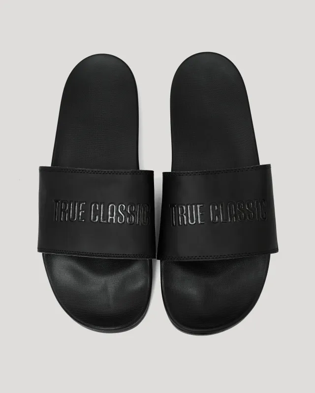 Black Comfort Slides sold by True Classic