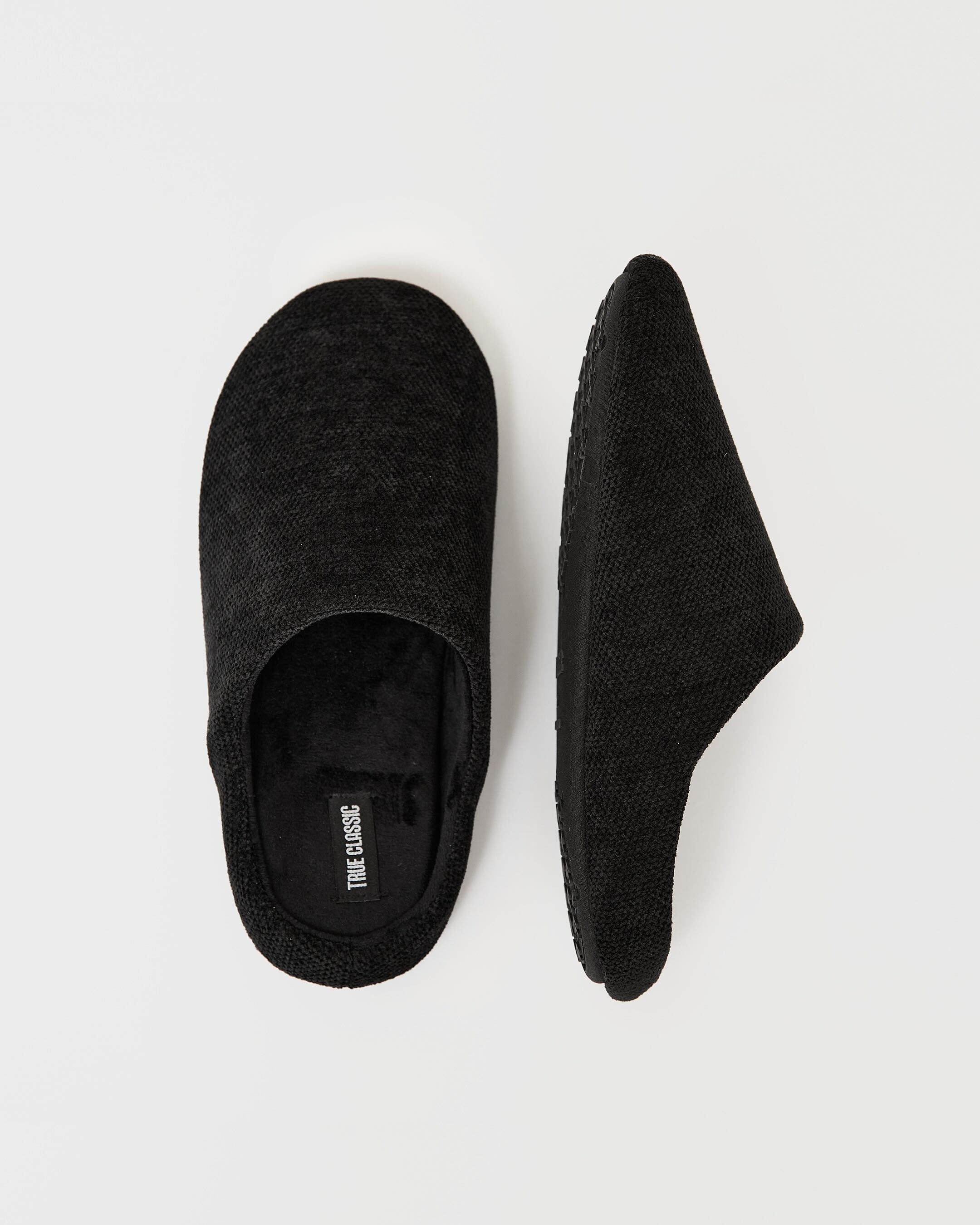Black Slippers sold by True Classic