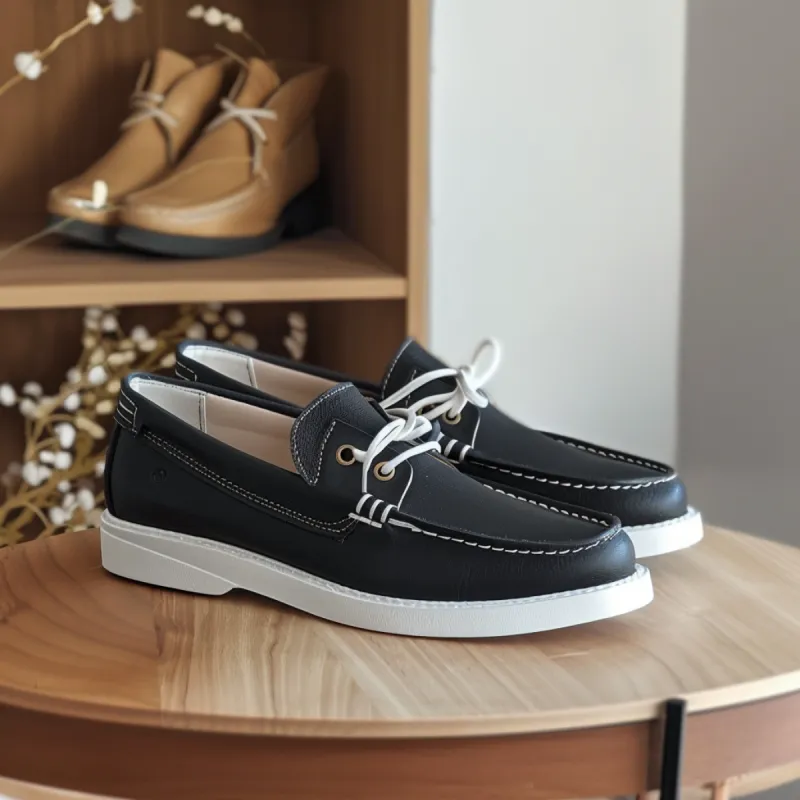 Black Lorenzo Boat Shoes with White Sole sold by Costoso Italiano
