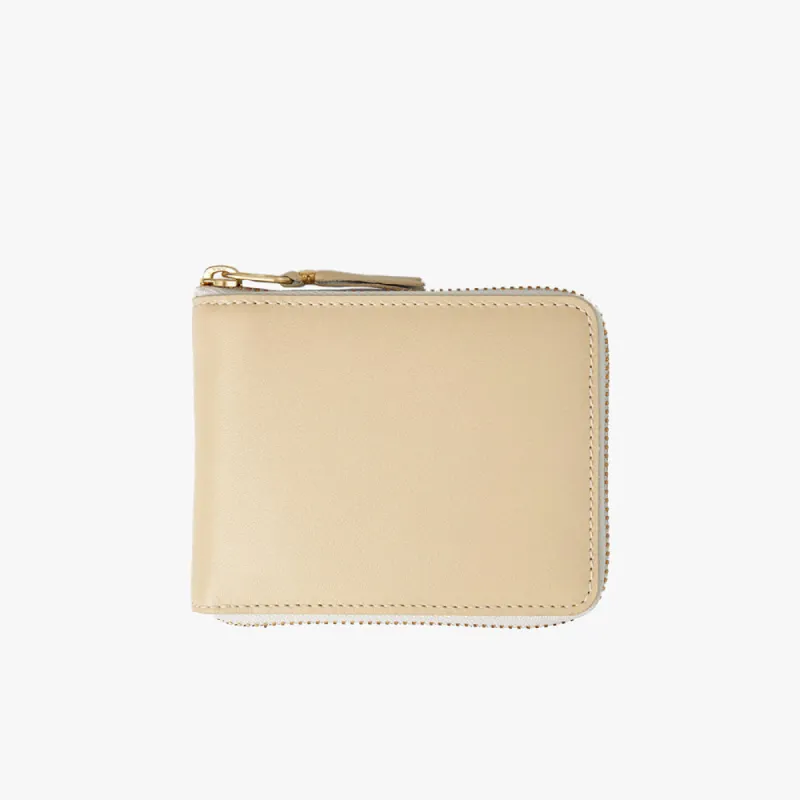 COMME des GARÇONS WALLET Classic Half Zip Wallet / Off White sold by Livestock