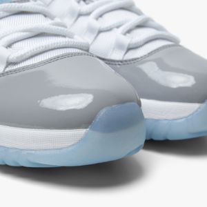 Jordan 11 Retro Low White / University Blue - Cement Grey sold by Livestock