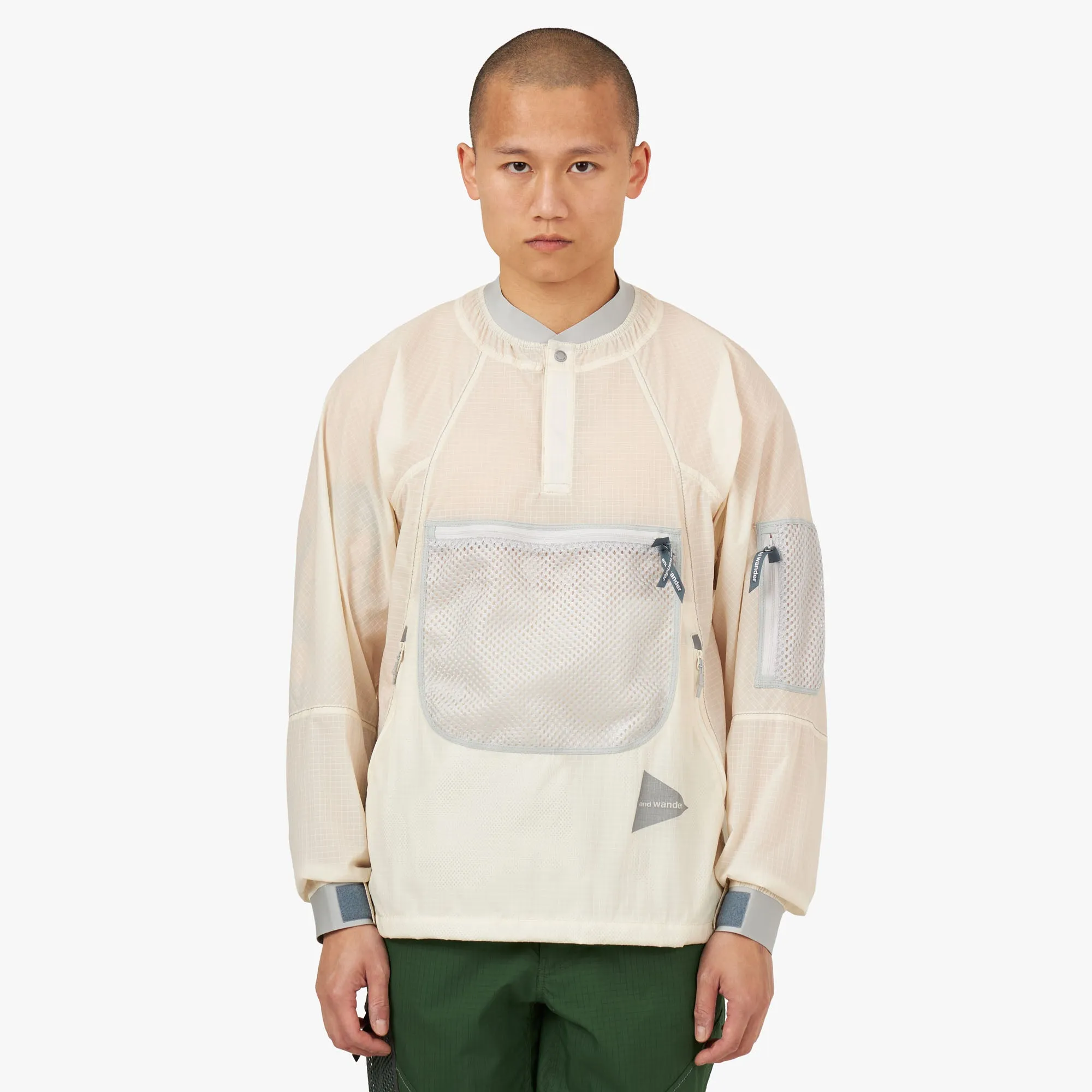 and wander Breath Rip Pullover Jacket / Off White sold by Livestock