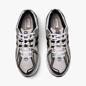 New Balance M1906RA Metallic Silver / Metallic Gold sold by Livestock